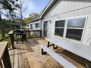 Outdoor dining - Cattlemens Quarters beautiful ranch setting with fenced yards and a great deck! (Tyler)