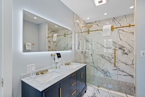 Bathtub, hair dryer, towels