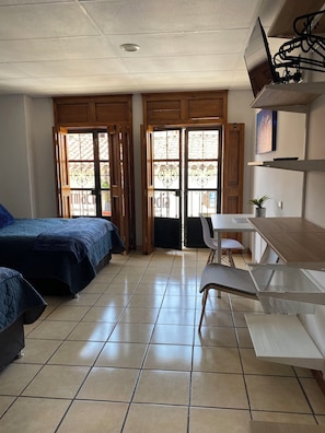 Standard Room | Premium bedding, pillowtop beds, individually decorated, desk