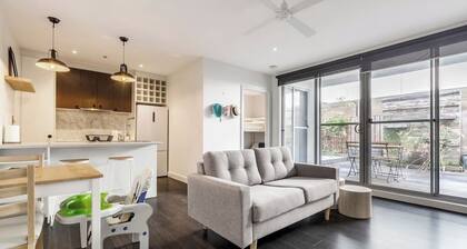 Stroll to the beach + Indoor Parking!