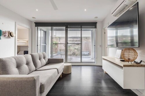 Stroll to the beach + Indoor Parking!