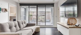 Stroll to the beach + Indoor Parking!