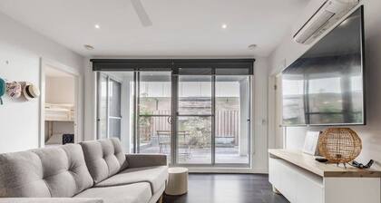 Stroll to the beach + Indoor Parking!