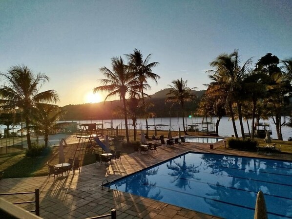 Outdoor pool, pool umbrellas, pool loungers