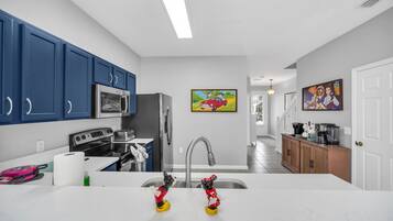 Family Townhome | Private kitchen | Espresso maker, coffee/tea maker