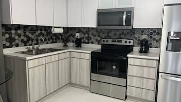 Microwave, oven, stovetop, coffee/tea maker