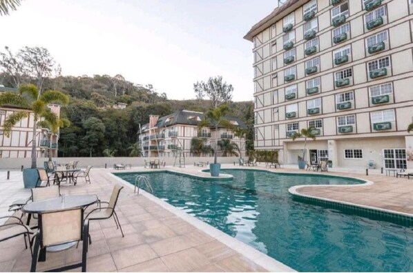 Outdoor pool, a heated pool - Studio in Itaipava at the Granja Brasil Resort is your best option. (Petrópolis)