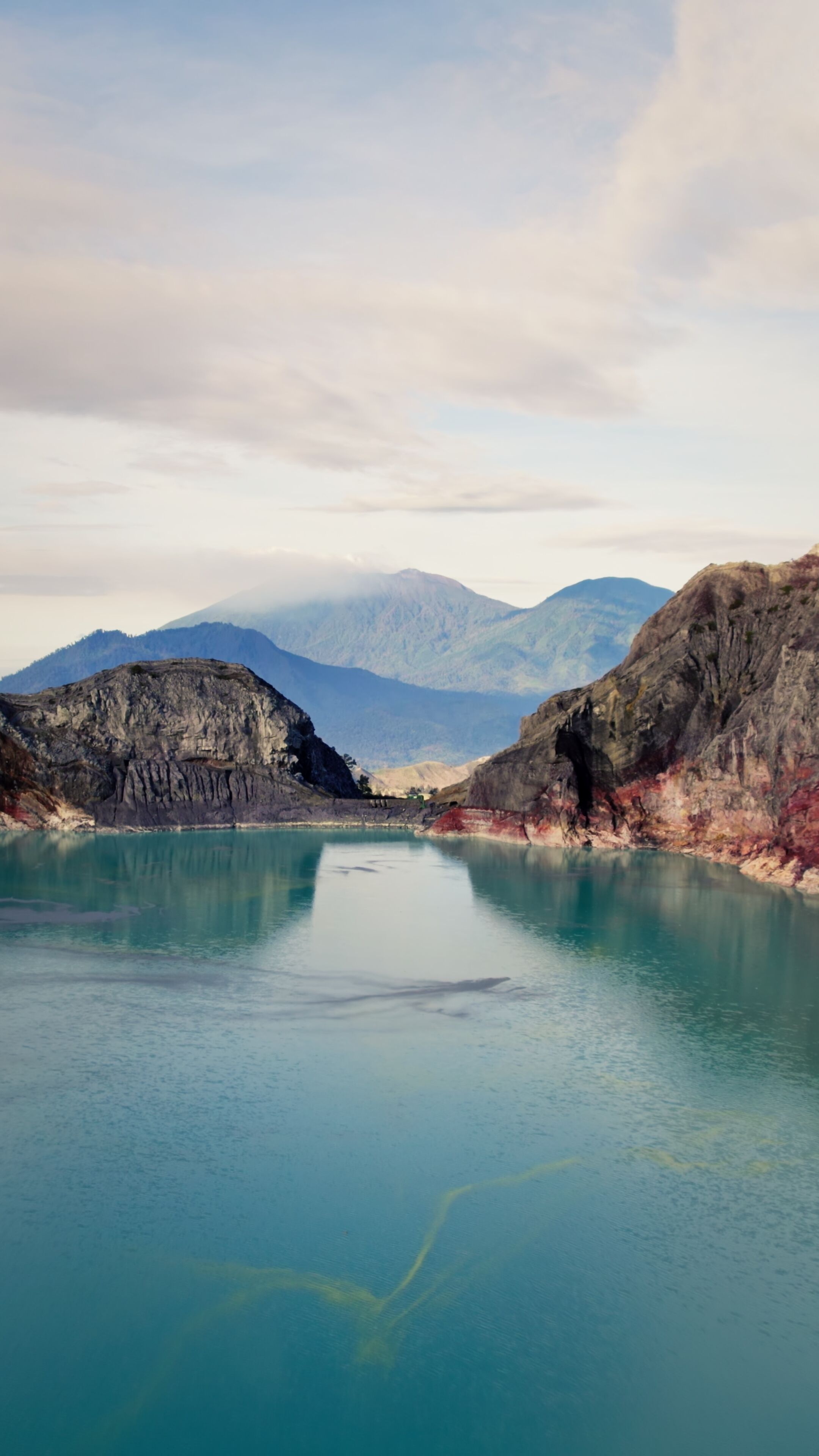 A serene lake surrounded by mountains.