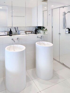 Shower, eco-friendly toiletries, hair dryer, towels