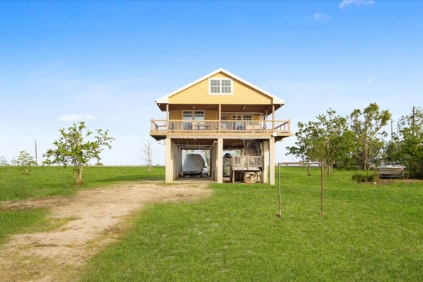 Lots of outdoor space with deck views and private boat parking!