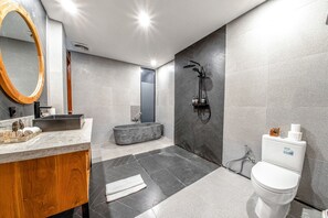 Bathtub, hair dryer, towels