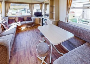 TV - Comfortable and spacious 10ft-wide caravan with one double and one twin. (Perranporth)
