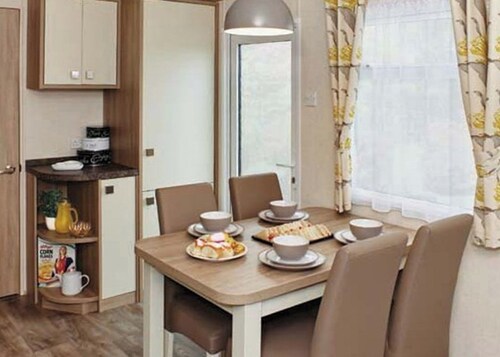 12ft-wide caravan with one double and two twin.