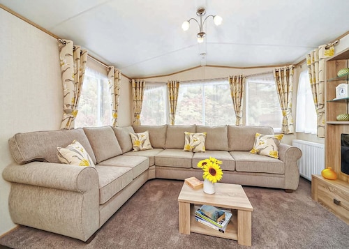 12ft-wide caravan with one double and two twin.