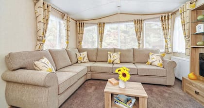 12ft-wide caravan with one double and two twin.