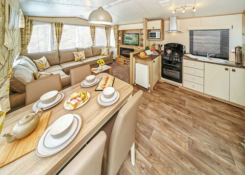 12ft-wide caravan with one double and two twin.