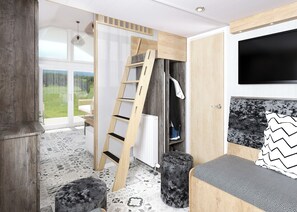 Une chambre moderne avec une échelle en bois, un lit avec une literie à motifs, une télévision et une vue sur l’extérieur.
