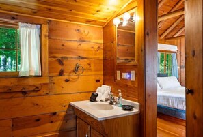 Shower, hair dryer, towels, shampoo