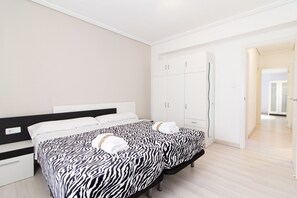4 habitaciones, tabla de planchar con plancha, wifi y ropa de cama 