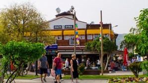 A building with a sign reading "EKIN OTEL" and a balcony with satellite dishes. - Ekin Otel (Fethiye)