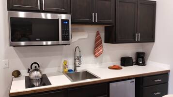 Microwave, stovetop, coffee/tea maker, toaster