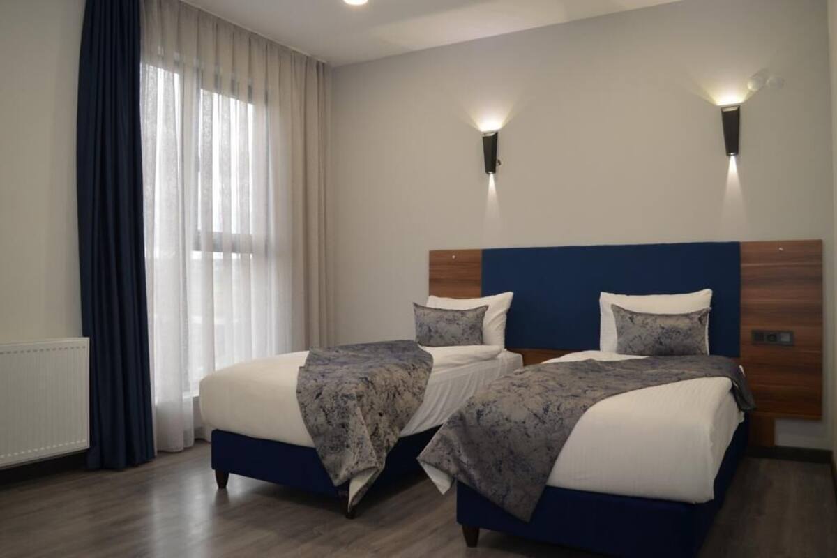 Chambre Standard avec lits jumeaux, 2 lits une place | Literie de qualité supérieure, bureau, Wi-Fi gratuit