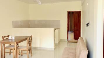 Chambre Double Confort | Coin séjour