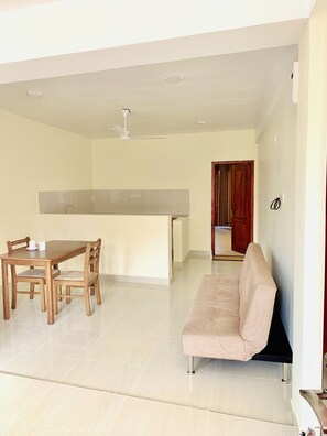 Quarto casal conforto | Área de estar
