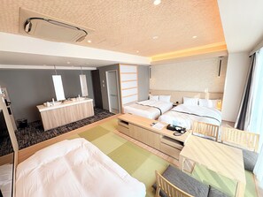 A modern hotel room with two beds, a small desk, a vanity, and a bathroom. - Tosei Hotel COCONE Tsukiji Ginza Premier (Tokyo)