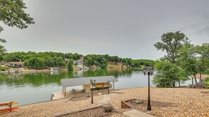 A lakeside park with a gazebo, benches, and a wooden deck. - Bella Vista Home w/ Kayaks & Deck on Loch Lomond! (Bella Vista)