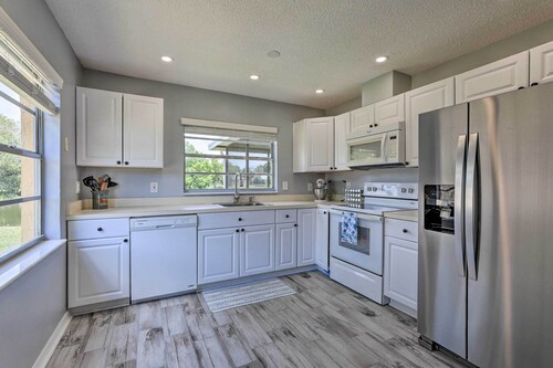 Lanai & Pond at Tranquil Bradenton Retreat!