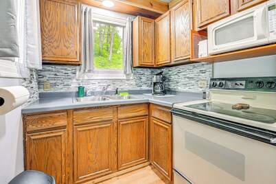 Lakefront Cabin w/ Fire Pit, Dock, & Boat Rental