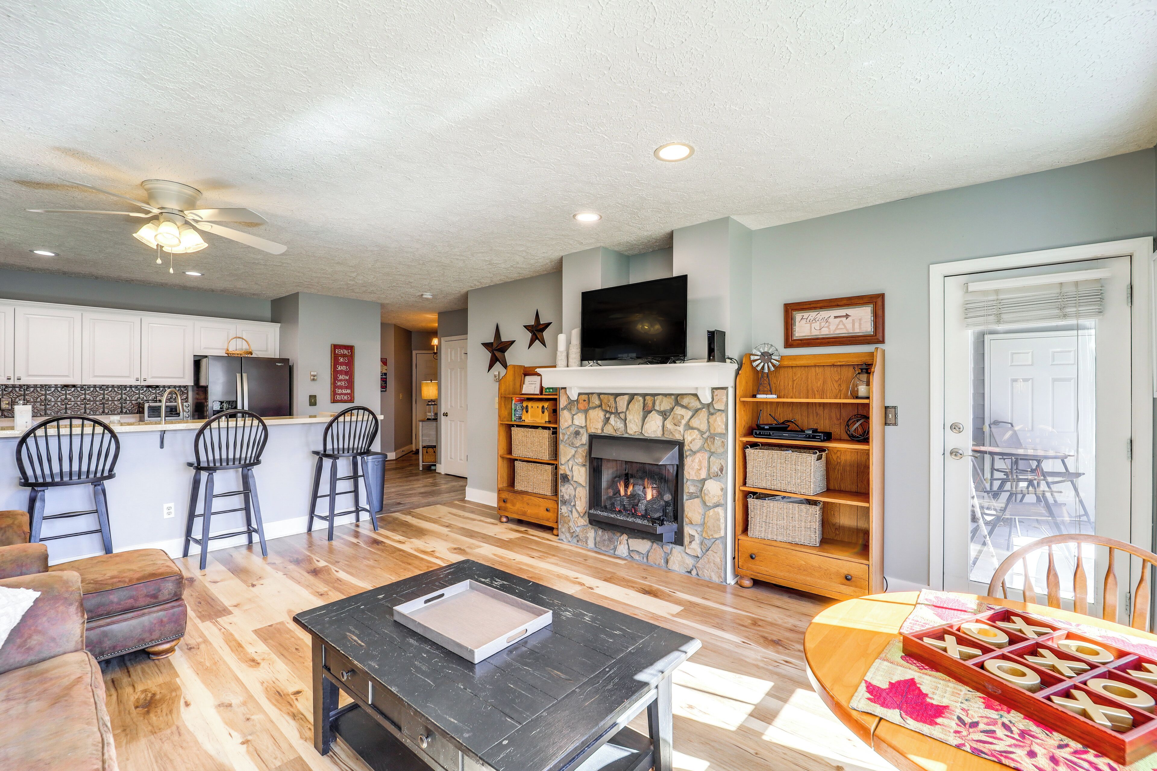 Apartment (2 Bedrooms) | Living area | Fireplace, video-game console