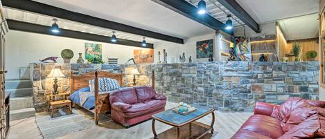 Apartment (1 Bedroom) | Living area | Fireplace, books