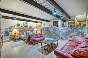 Apartment (1 Bedroom) | Living area | Fireplace, books