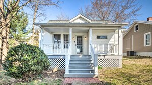 A two-story house with a front porch, a set of stairs leading to the door, and a small brick pathway in front. - Historic Staunton Home ~ 1 Mi to Downtown! (Staunton)