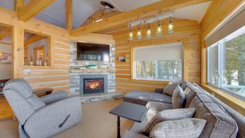 Cottage (3 Bedrooms) | Living area | TV, fireplace