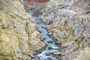 A narrow canyon with a river flowing through it. - 'cedar Mountain Hideout' By Cody Night Rodeo! (Cody)