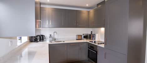 Fridge, dishwasher, electric kettle, toaster