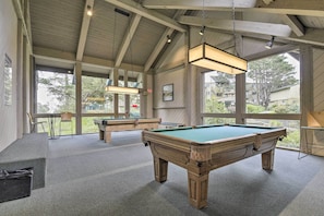 A pool table in a room with large windows, wooden beams, and a bench. - Cali Studio w/ Resort Perks: 6 Mi to San Fran (Daly City)
