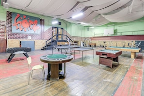 An indoor recreational area with a pool table, a billiards table, and a poker table. - Direct Trail Access! ATV Riding Home Base in Gary (Gary)
