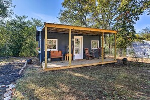 A small wooden structure with a porch, a door, and a window. - Hot Springs Studio ~ 3 Mi to National Park! (Hot Springs)