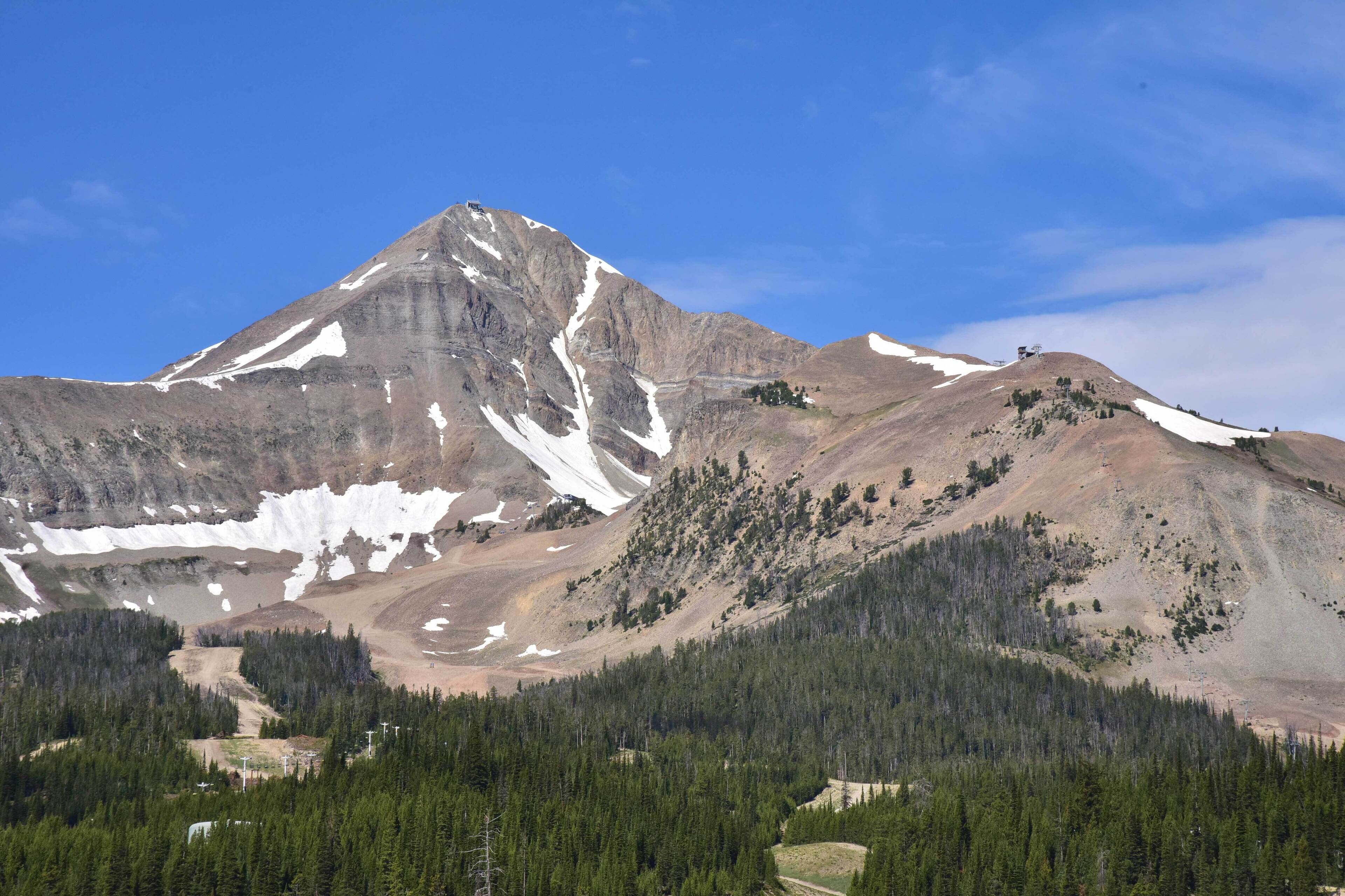 A mountain landscape with a clear sky.