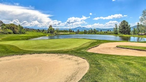 A golf course with sand bunkers, water hazards, and a pond. - Cozy Eden Condo Retreat < 6 Mi to Ski Resort! (Eden)