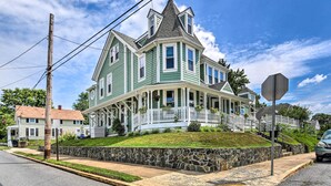 A large, two-story house with a prominent gable roof and a wrap-around porch. - Brunswick Retreat < 1 Mi to Potomac River! (Brunswick)