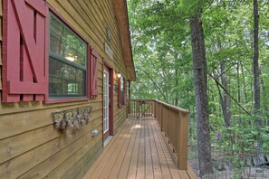 A wooden cabin with a deck, surrounded by trees. - Murphy Family Cabin w/ Fire Pit & Forest Views! (Murphy)
