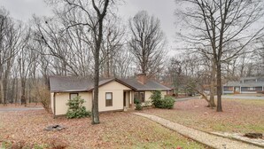 A single-story house with a sloped roof, a front porch, and a pathway leading to the entrance. - Lovely Massanutten Getaway w/ Resort Access! (McGaheysville)