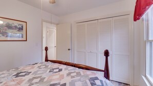 A bedroom with a bed, a closet, and a window. - Lovely Massanutten Getaway w/ Resort Access! (McGaheysville)