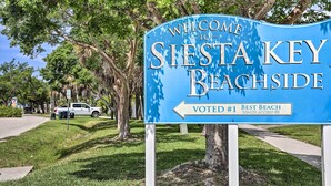 A welcome sign for Siesta Key Beachside, indicating it is voted #1 best beach access. - Remodeled Siesta Key Studio Near Beach! (Siesta Key)