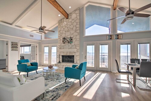 Sunny Lakefront Escape w/ Private Beach & Deck